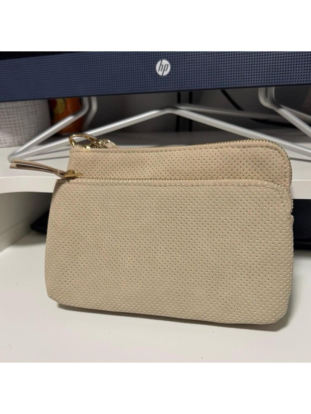 taupe Universal Thread wristlet features a perforated faux-leather design